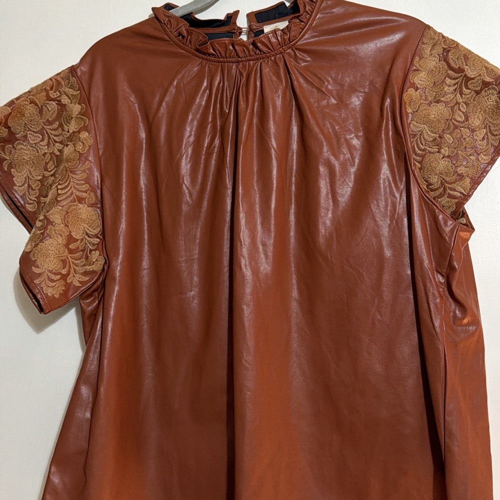 Chic Leather Blouse with Embroidered Sleeves